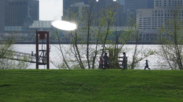 A family strolling along the levee