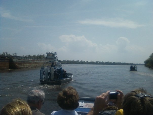 On board, with a big boat on the left