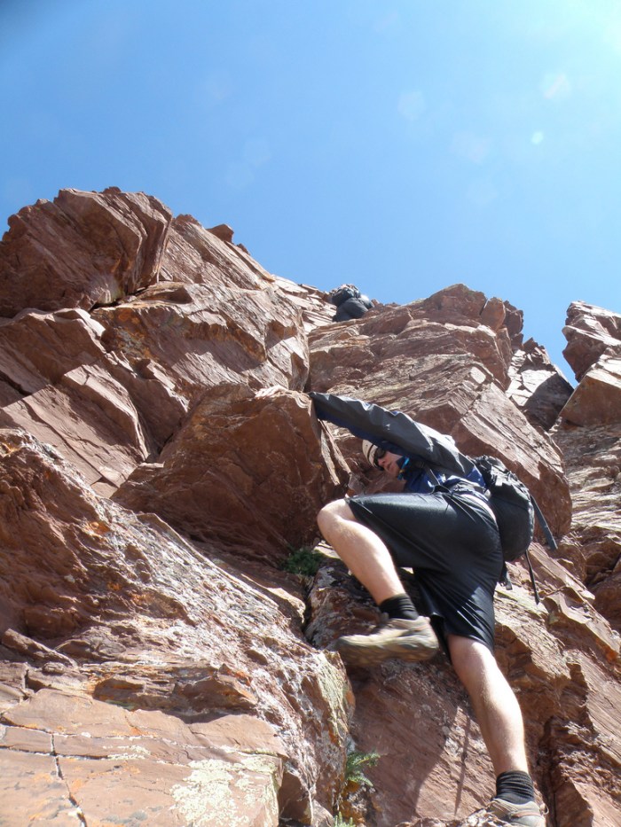 Chris starting up to the first class 5 move with me topping out. Photo: Alan
