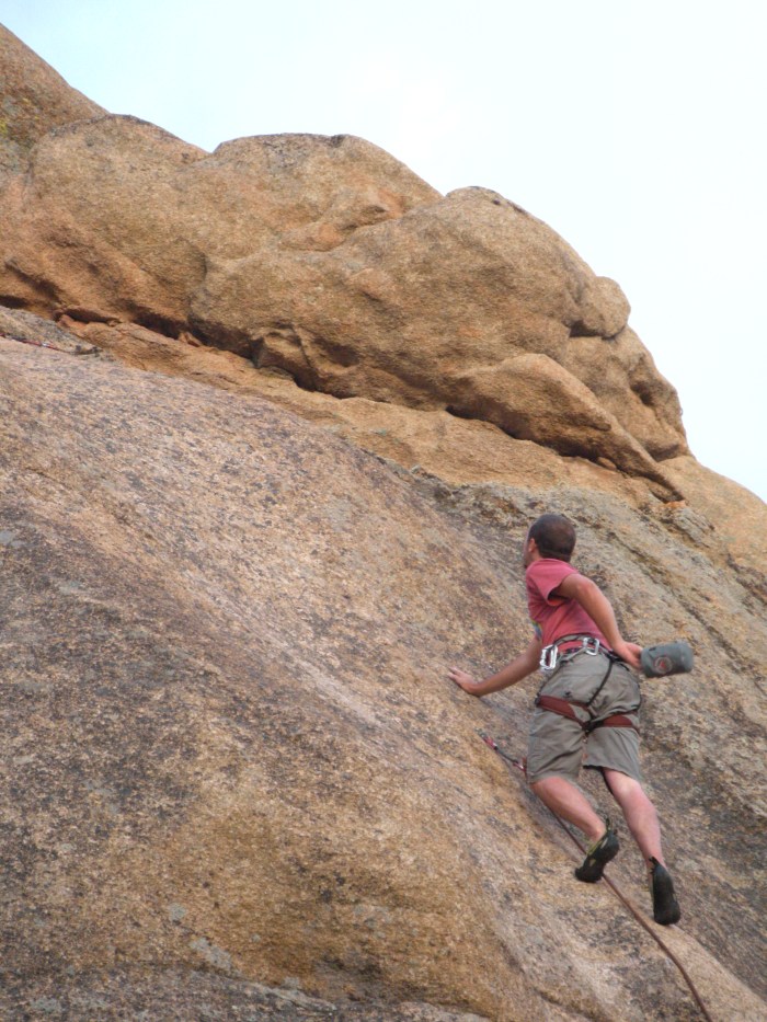 Steve getting up on rock