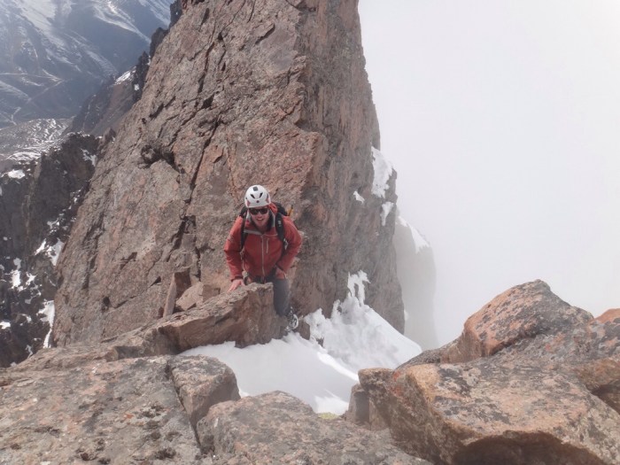 Your author safely across, with a lot of air below and still some more climbing to go