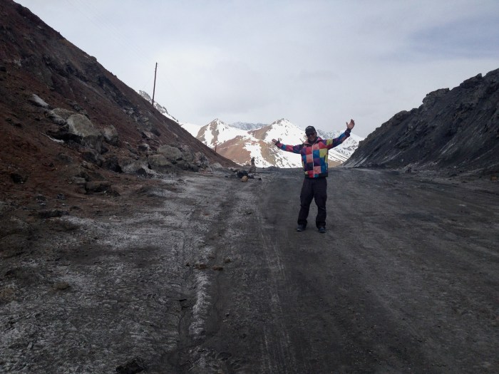 Your author at the top of Ak-Baital Pass, surrounded by dirt but the technicolor dream hoody in full effect