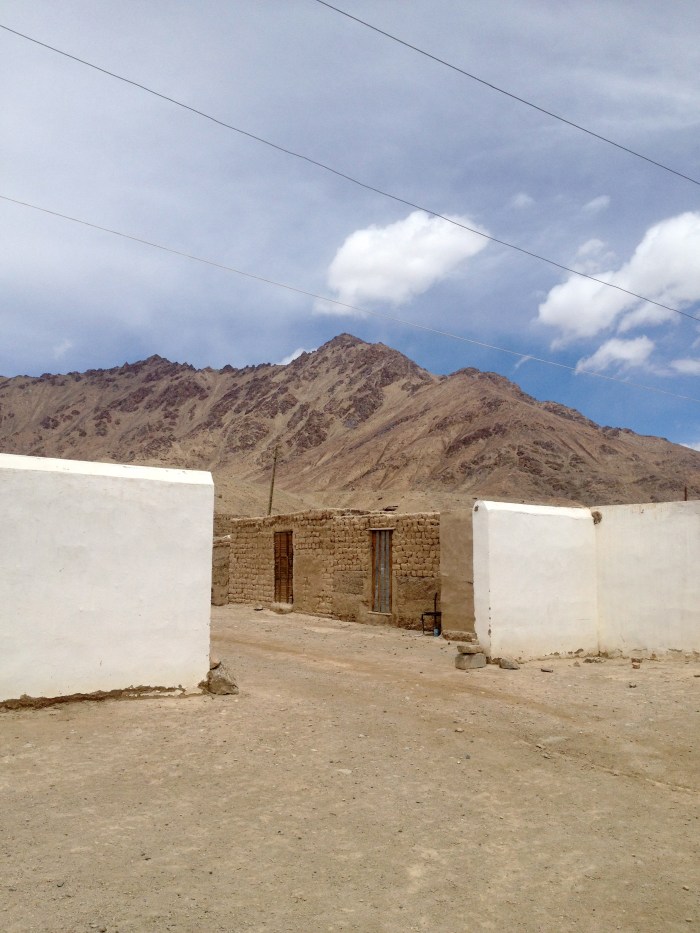 View between the sleeping rooms and outhouse at the Guest House